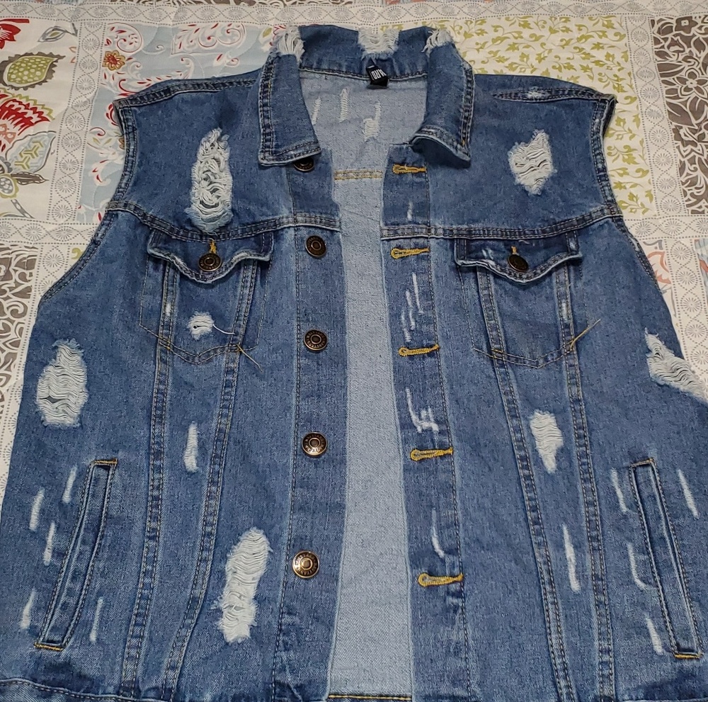 Ripped jean vest